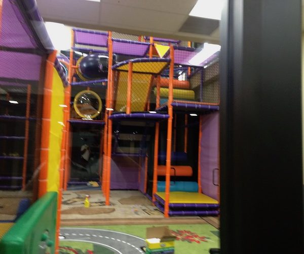 themed cityscape traffic carpet with high rise indoor playground