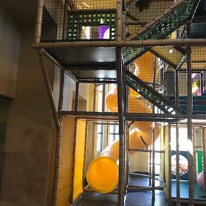 three story yellow spiral slide and climb inside youth ministry