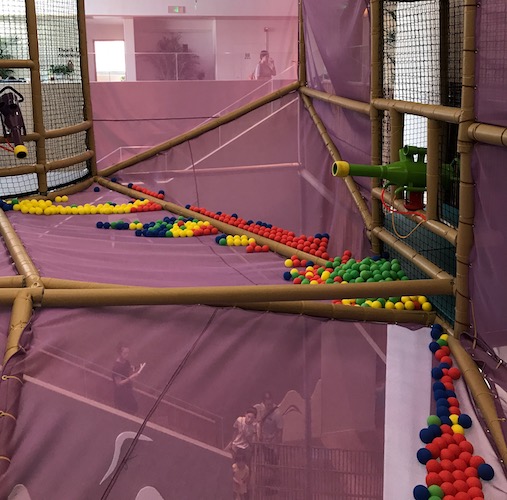 gravity feed ball return for foam ball shooter components for indoor playgrounds